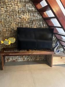 Et tv og/eller underholdning på Cond Pé na Areia Victory Lucena