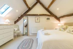 Ένα ή περισσότερα κρεβάτια σε δωμάτιο στο Coed-Stable