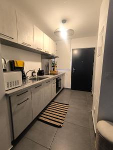 Kuchyň nebo kuchyňský kout v ubytování Stay In Tahiti + 3 fotografie