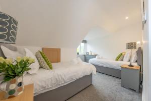 Ένα ή περισσότερα κρεβάτια σε δωμάτιο στο Erw-Fair