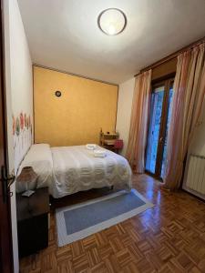 Ένα ή περισσότερα κρεβάτια σε δωμάτιο στο Paolo&SilviaHost