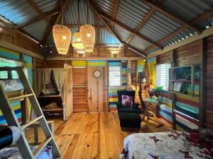 Postel nebo postele na pokoji v ubytování EL GALLO ECOLODGE