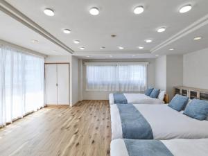 Ένα ή περισσότερα κρεβάτια σε δωμάτιο στο LIVE HEART House