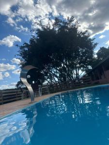 Πισίνα στο ή κοντά στο Tríade Chalé da Canastra 1