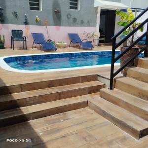 Bazén v ubytování Suíte Luxo Refúgio das Ostras nebo v jeho okolí