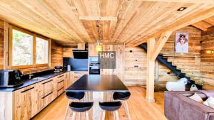 Køkken eller tekøkken på Chalet 1ère Étoile une vue à couper le souffle