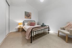 Ένα ή περισσότερα κρεβάτια σε δωμάτιο στο Modern CBD Hideaway - 2 mins to Bendigo Hospital