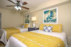 Postel nebo postele na pokoji v ubytování Crescent Shores South - 612 + 40 fotografií