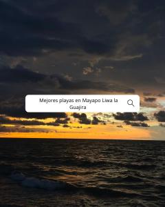 Una captura de pantalla de un mensaje de texto sobre microbios reproduce un Mayopus Live La Coli. en Mayapo Liwa 1, en Manaure