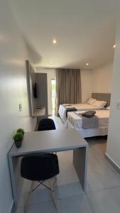 Postel nebo postele na pokoji v ubytování Villa Eco Barra- Apartamento 106 + 5 fotografií