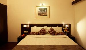 Letto o letti in una camera di The Byke Old Anchor Beach Resort & Spa
