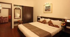 Letto o letti in una camera di The Byke Old Anchor Beach Resort & Spa