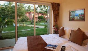 Letto o letti in una camera di The Byke Old Anchor Beach Resort & Spa
