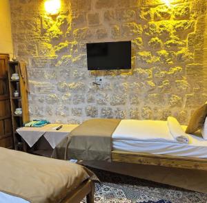 Et tv og/eller underholdning på Kasr-ı Han Konağı Otel + 21 billeder