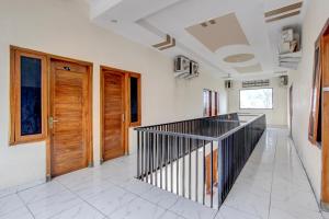 Fotografie z fotogalerie ubytování OYO 94919 Nay Guesthouse Dan Kost v destinaci Colomadu