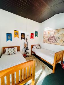 Кровать или кровати в номере The Burrow - A Modern Loft-Style Luxury Villa