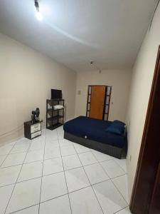 Ένα ή περισσότερα κρεβάτια σε δωμάτιο στο Pousada cosmo +17 φωτογραφίες