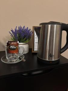 Příslušenství pro přípravu čaje a kávy v ubytování Céntrico dpto