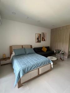 Ένα ή περισσότερα κρεβάτια σε δωμάτιο στο Edificio DELVENTTO- Pozos Colorados -Apartaestudio