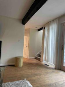 Ένα ή περισσότερα κρεβάτια σε δωμάτιο στο Cozy remodeled Cottage