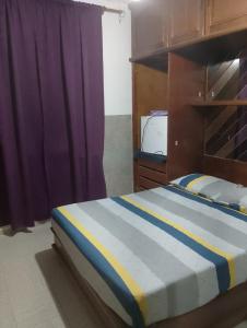 Postel nebo postele na pokoji v ubytování Pousada dos Mestres