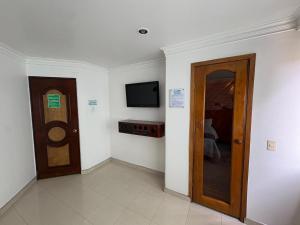 TV a/nebo společenská místnost v ubytování Lavid Hotel Palacio Real