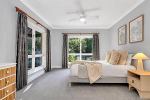 Ένα ή περισσότερα κρεβάτια σε δωμάτιο στο Vigneron Retreat Minutes to McLaren Vale Wineries