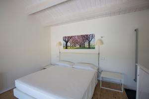 A bed or beds in a room at Il Portico