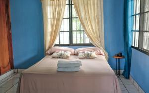 Ένα ή περισσότερα κρεβάτια σε δωμάτιο στο Apto casco histórico Acropolis