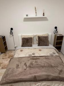 Una cama o camas en una habitación de Studio Cosy