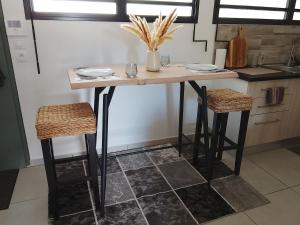 Η κουζίνα ή μικρή κουζίνα στο T2 quartier résidentiel la plaine st- Paul