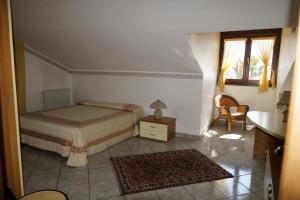Posteľ alebo postele v izbe v ubytovaní Villa esclusiva con piscina privata e vista Etna