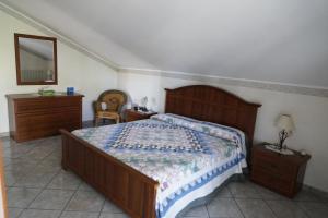 Posteľ alebo postele v izbe v ubytovaní Villa esclusiva con piscina privata e vista Etna