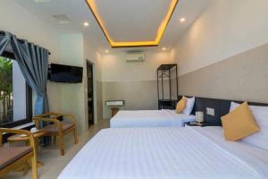 TV a/nebo společenská místnost v ubytování MAYA HOMESTAY villa