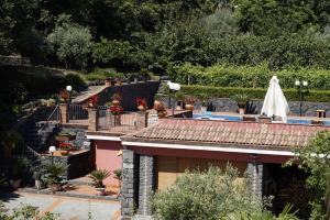 Vonkajšia záhrada v ubytovaní Villa esclusiva con piscina privata e vista Etna
