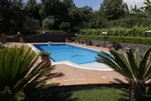 Bazén v ubytovaní Villa esclusiva con piscina privata e vista Etna alebo v jeho blízkosti