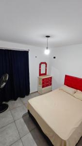 En eller flere senge i et værelse på Cabaña la Fride