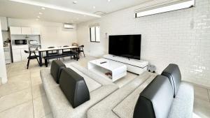 Μια τηλεόραση ή/και κέντρο ψυχαγωγίας στο Grandioso Onna 7-D - Vacation STAY 17394v