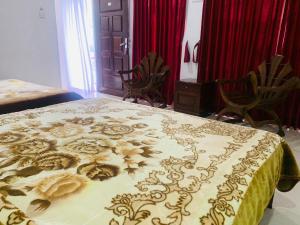 Ένα ή περισσότερα κρεβάτια σε δωμάτιο στο Misty Crown