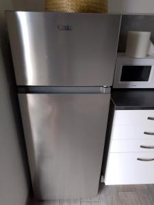 Kuchyň nebo kuchyňský kout v ubytování Ti case Les Girofles