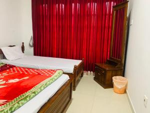 Ένα ή περισσότερα κρεβάτια σε δωμάτιο στο Misty Crown +1 φωτογραφίες