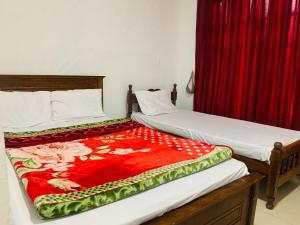 Ένα ή περισσότερα κρεβάτια σε δωμάτιο στο Misty Crown