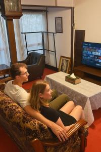 TV a/nebo společenská místnost v ubytování KANAZAWA Retro House NEKO-NOMA