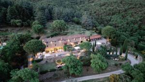 an aerial view of a large house with trees at Villa Montanare - romantic escape Tuscany in Cortona