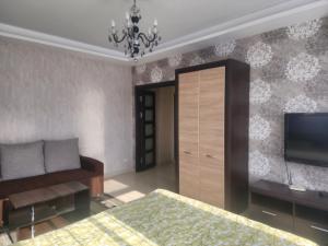 Μια τηλεόραση ή/και κέντρο ψυχαγωγίας στο Apartment KG