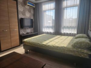 Ένα ή περισσότερα κρεβάτια σε δωμάτιο στο Apartment KG