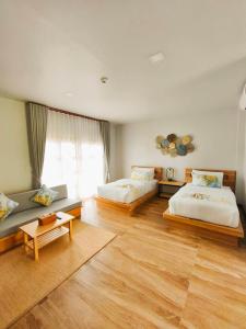 Ένα ή περισσότερα κρεβάτια σε δωμάτιο στο Secrest Boutique Kohtao Thailand