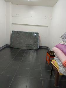 Ένα ή περισσότερα κρεβάτια σε δωμάτιο στο Renz transient house