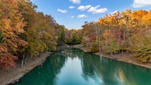 an aerial view of a river in the fall at Secluded Lakeview Retreat 10 Mins to Leipers Fork in Kingfield