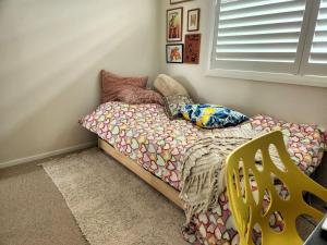 Ένα ή περισσότερα κρεβάτια σε δωμάτιο στο Kiama Downs Oasis with Pool, Spa & Sauna +8 φωτογραφίες